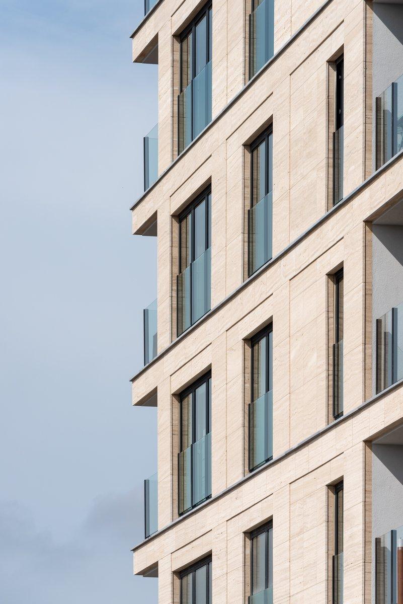 Travertino Cladding FAÇADE CLADDING IN TRAVERTINO ROMANO CLASSICO VEIN CUT LIGHT